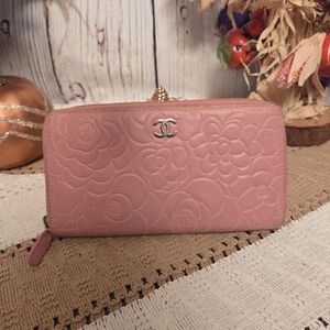 Authentic Chanel Lambskin Pink Floral Embossed Zip Around Wallet